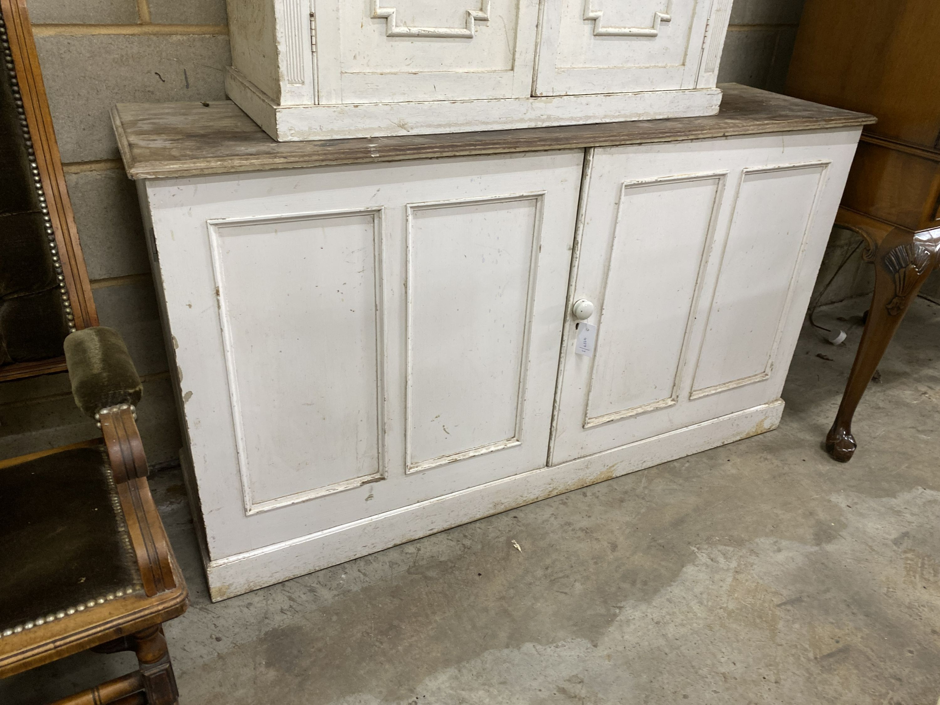 A Victorian painted two door side cabinet, width 145cm, depth 42cm, height 80cm